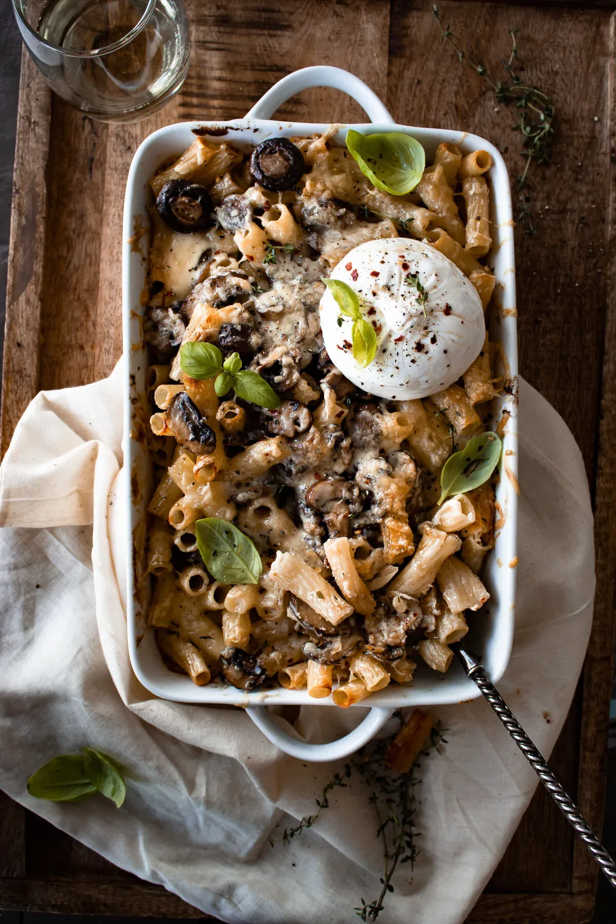 Baked Mushroom Pasta with Burrata in a white rectangular ceramic baking dish